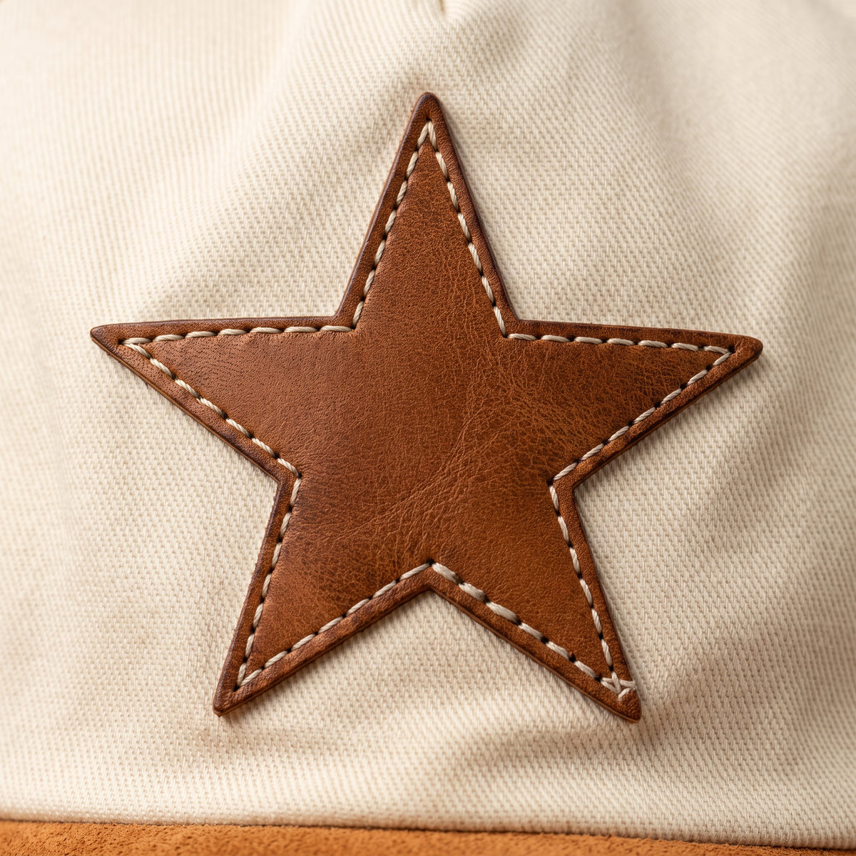 Burnt orange suede hat, unstructured, star patch detail