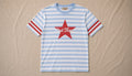 Out There Star Stripe Tee, light blue and white stripes with red star chest graphic