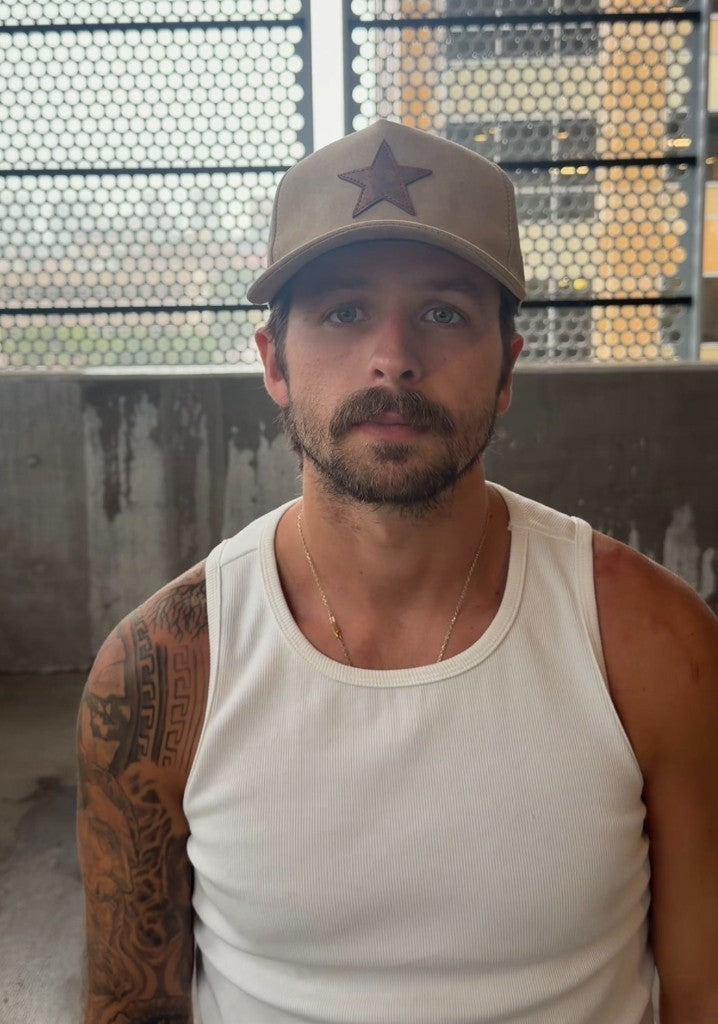 Tan suede buckle-back hat — lifestyle
